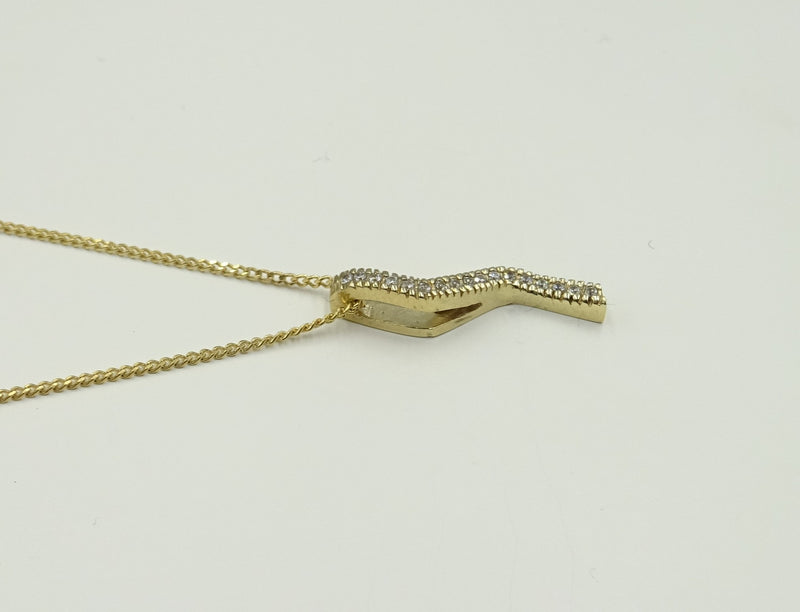 9ct gold CZ set Zig Zag style pendant on a chain. 2gr