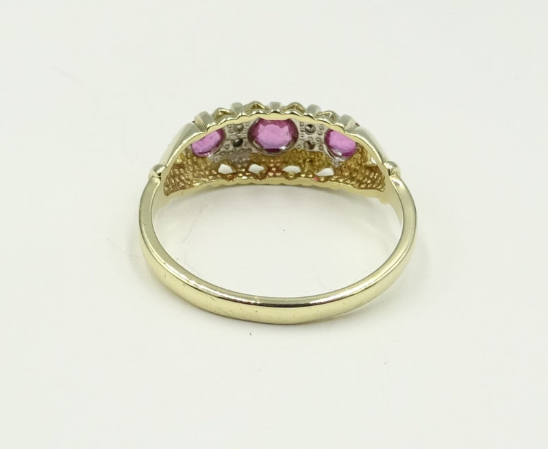 9ct gold Ruby and Diamond boat ring. 1.85gr