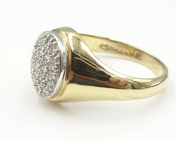 9ct gold pave set diamond oval signet ring 0.25ct. 5.28gr