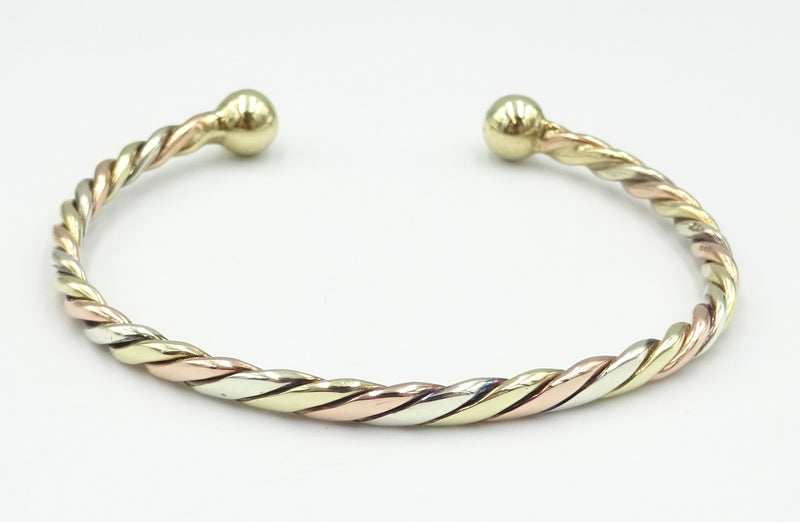 9ct 3 colour twist torque bangle. 15.2gr
