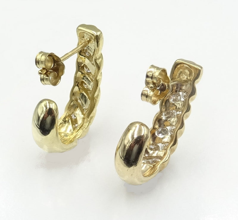 9ct gold diamond set 'J' shape earrings. 0.50ct total. 4.67gr