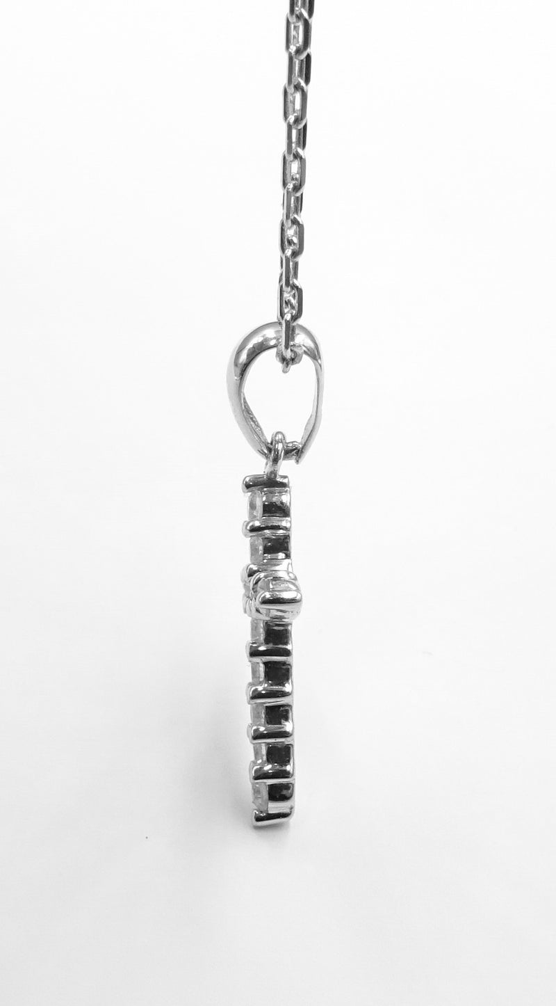 18ct white gold diamond set cross on chain. 0.20ct total. 2.75gr