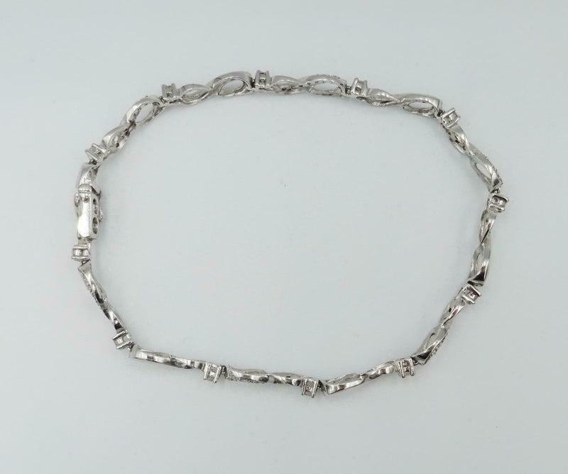 9ct White Gold Diamond Infinity Tennis Bracelet Ladies 0.54ct 7inch 7.5g 5.3mm - Richard Miles Jewellers