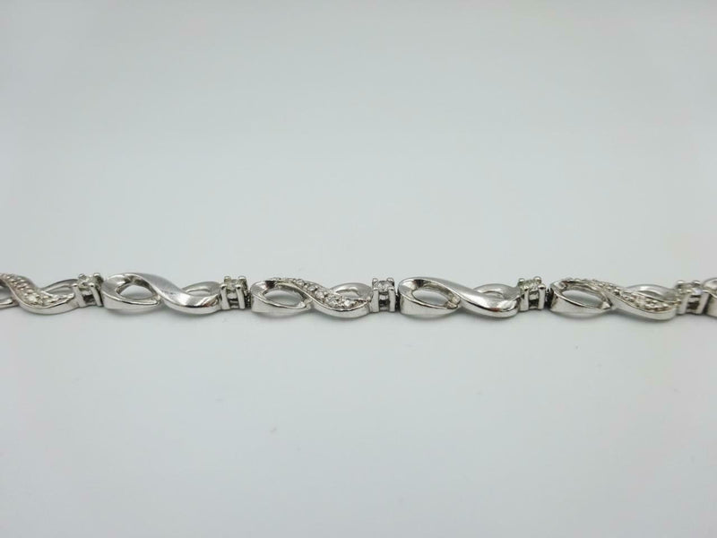 9ct White Gold Diamond Infinity Tennis Bracelet Ladies 0.54ct 7inch 7.5g 5.3mm - Richard Miles Jewellers