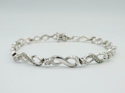 9ct White Gold Diamond Infinity Tennis Bracelet Ladies 0.54ct 7inch 7.5g 5.3mm - Richard Miles Jewellers