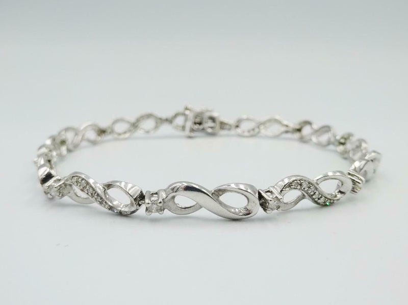 9ct White Gold Diamond Infinity Tennis Bracelet Ladies 0.54ct 7inch 7.5g 5.3mm - Richard Miles Jewellers