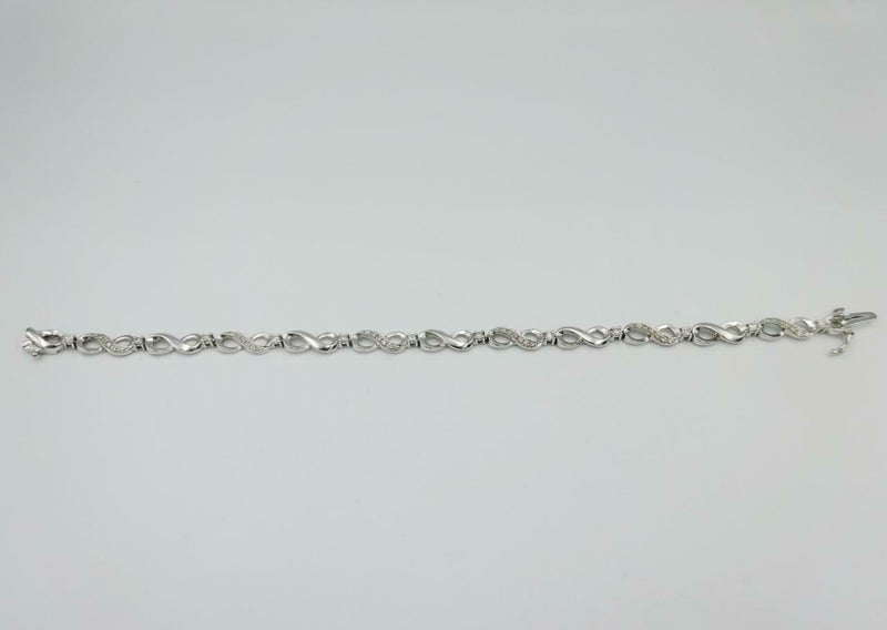 9ct White Gold Diamond Infinity Tennis Bracelet Ladies 0.54ct 7inch 7.5g 5.3mm - Richard Miles Jewellers