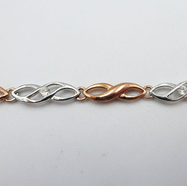 9ct 2 Colour White Rose Gold 0.16ct Diamond Infinity Ladies Bracelet 8.25inch 5g - Richard Miles Jewellers